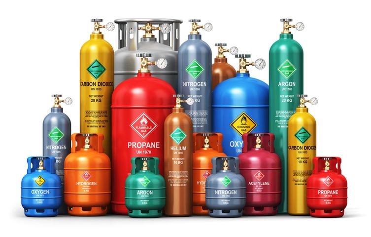 group of 16 gas cylinders of various sizes and colors